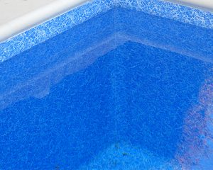 marmol azul canto piscina